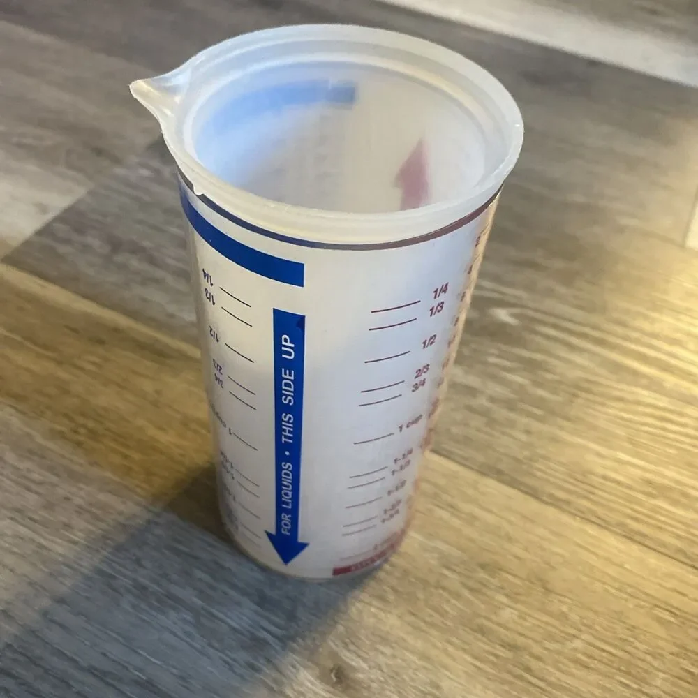 The Pampered Chef Measure-All Dry/Wet Measuring 2 Cup Push-Up Design #2225